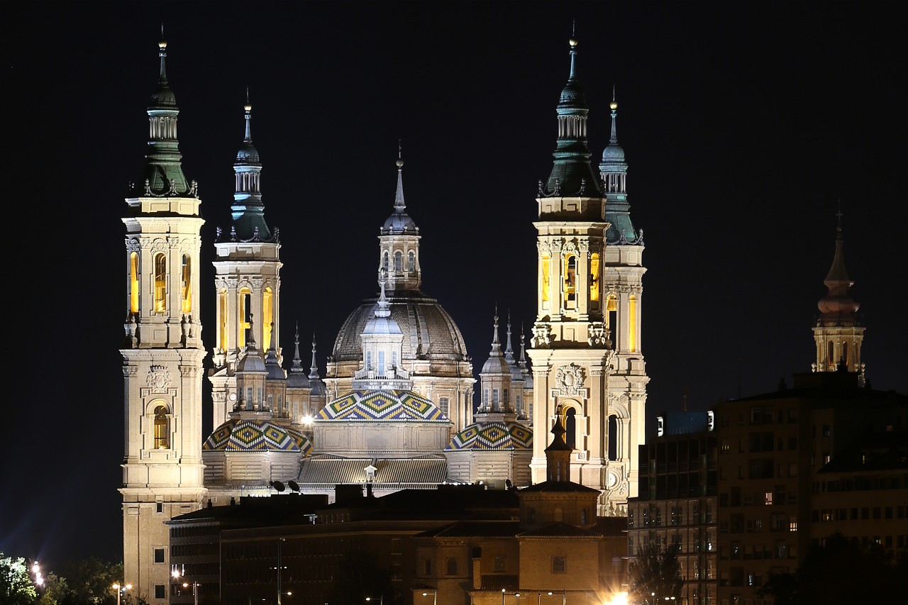 Zaragoza. Cathedral of our lady of Pilar at night. The view from the bridge of the Almozara
